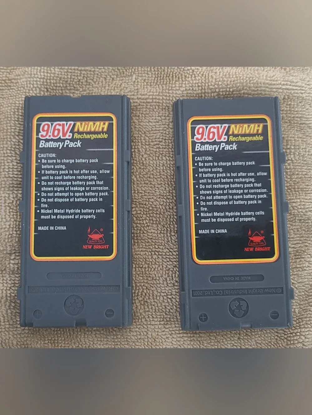 New Bright 9.6V NiMH Battery Charger and PacksNew Bright 9.6 Volts 1200 Bundle